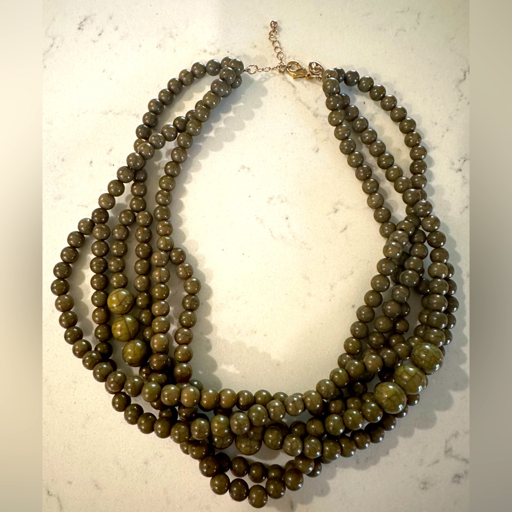 Chunky, beaded, green statement necklace.